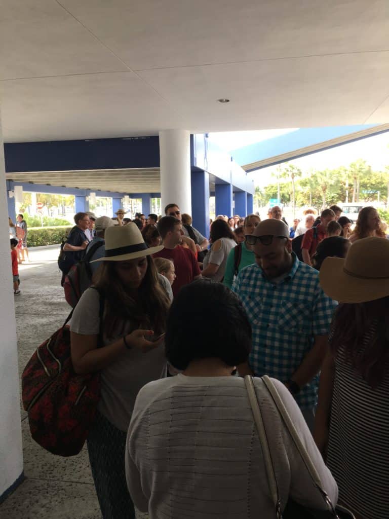 Growing line of people behind us
