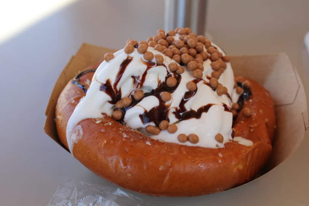 Warm Caramel-Stuffed Salted Pretzel with Soft-Serve Ice Cream and Chocolate Sauce