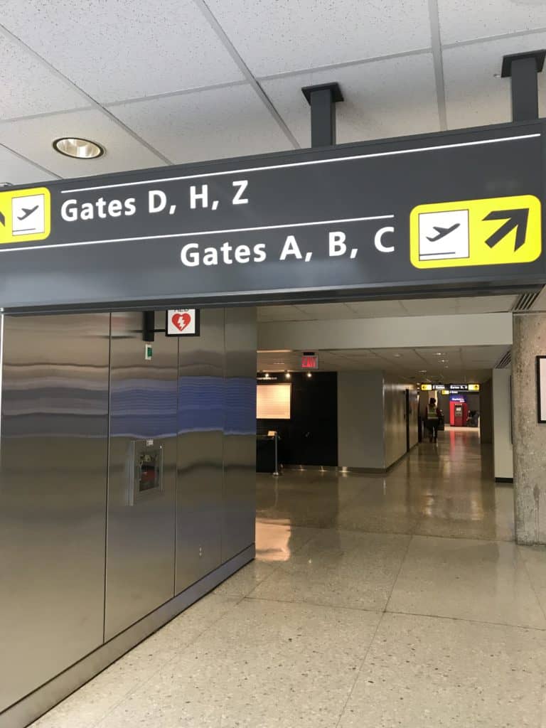 Signs direct you to your gate at Dulles Airport