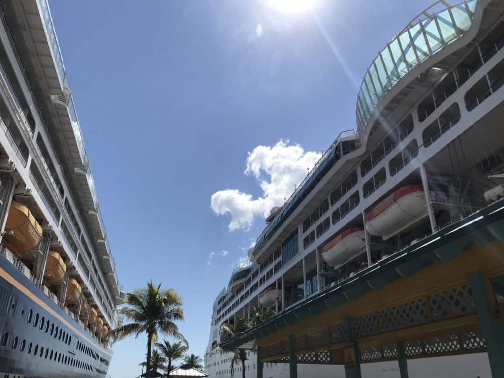 Disney Magic next to Empresses of the Seas